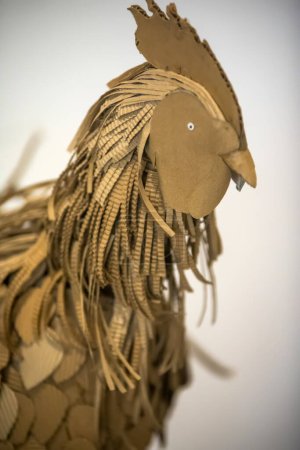 Foto de Close up of handmade rooster statue - Imagen libre de derechos