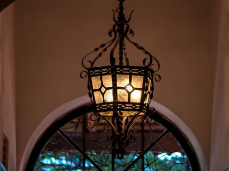 Photo for Glowing old lamp inside home - Royalty Free Image