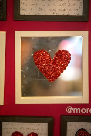 Photo for Red heart shape on frame - Royalty Free Image