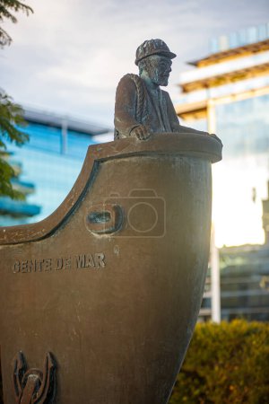 Photo for Statue of sailor man in boat - Royalty Free Image