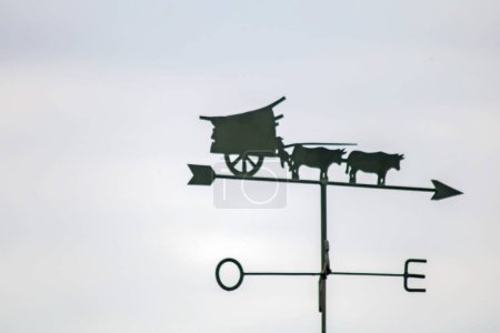 Photo for Weather vane with carriage on top - Royalty Free Image