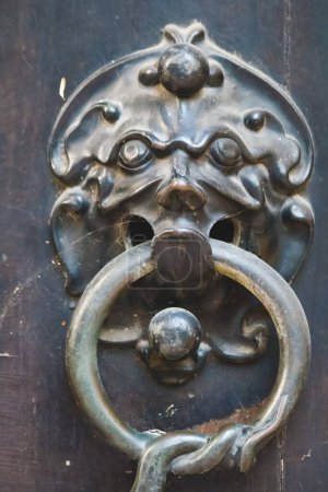 Photo for Door knocker with a metal ring on it - Royalty Free Image