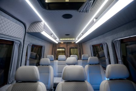 comfortable passenger bus interior with upholstered seats