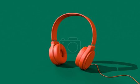 Photo for Bright orange headphones on green background. 3D render - Royalty Free Image