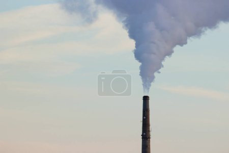 close up shot of plant stack emitting smoke-stock-photo