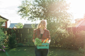 farmer carrying box of picked vegetables Sweatshirt #640440422