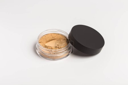 Photo for Mineral makeup powder isolated on white background. Light beige foundation powder. Skin tone face cosmetic product sample concept - Royalty Free Image