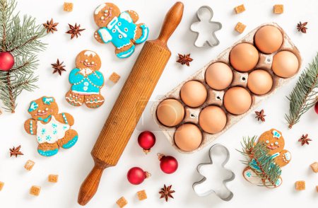Photo for Flat lay christmas background. Cooking gingerbread concept. Xmas holiday cookies on white background top view - Royalty Free Image
