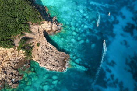 Photo for Beautiful summer seascape from air. Turquoise sea water, rocks and boats from top view, Island of sardinia in Italy. Travel backgroun - Royalty Free Image