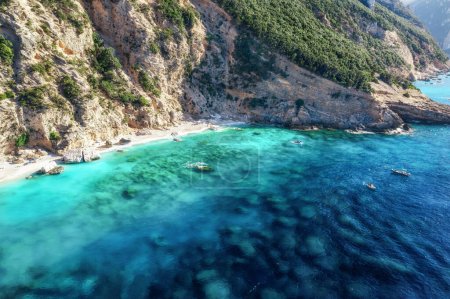 Photo for Beautiful summer seascape from air. Turquoise sea water with sandy beach and rocks from top view, Island of sardinia in Italy. Travel background - Royalty Free Image