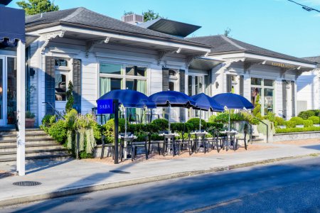 Photo for NEW ORLEANS, LA, USA - OCTOBER 6, 2022: Outdoor seating in front of Saba Restaurant on Magazine Street - Royalty Free Image