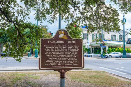 Photo for NEW ORLEANS, LA, USA - September 24, 2023: Selective Focus of Historic Marker for Treme Neighborhood with the French Quarter in the background - Royalty Free Image