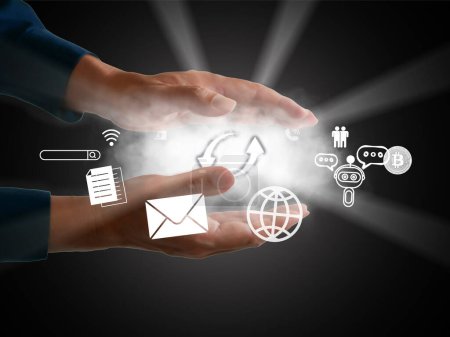 Cloud storage and technology concepts. Two hands holding on a cloud computing system with up and down arrows of information flow on a cloudy background and many online activities.