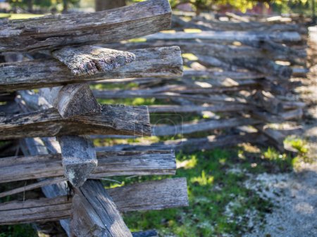 Photo for Intricate features of a vintage, traditional weathered wooden fence in Williamsburg, Virginia. - Royalty Free Image