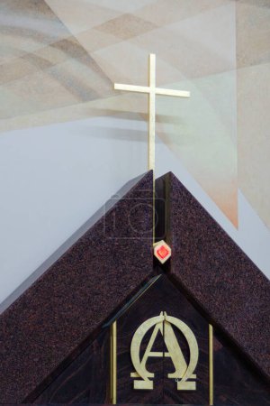 Photo for Wooden bright cross on altar in a church of Sventoji. Close view. - Royalty Free Image