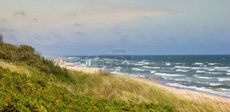Photo for Panoramic view of the wavy sea coast on a sunny summer day in Sventoji. Lithuania. - Royalty Free Image