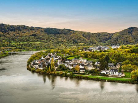Photo for Senhals village on the Moselle river bend and lush mountain in Cochem-Zell district, Germany - Royalty Free Image