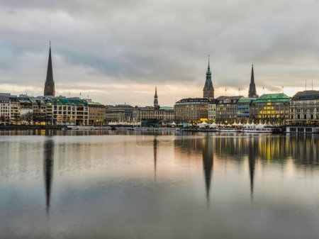 Photo for Hamburg city on tBinnenalster lake during sunset, Germany - Royalty Free Image