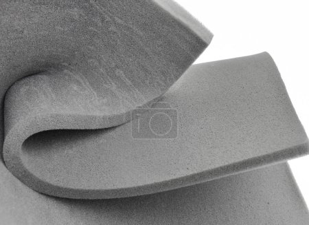 Photo for Bundled foam sponge. folded gray material. elastic sheet isolated on white background - Royalty Free Image