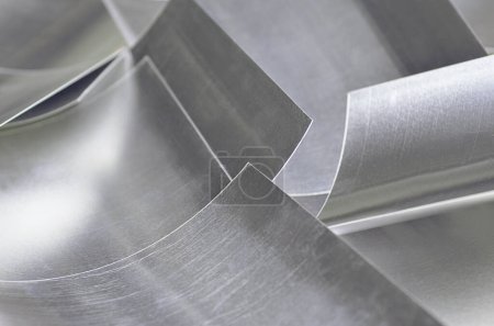 Photo for Aluminum metal sheets. industrial metal pile, production rectangular pieces. curved material - Royalty Free Image