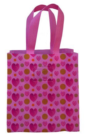 a pink polypropylene tote bag with heart symbol decoration isolated on white background. non woven. environmentally friendly bag