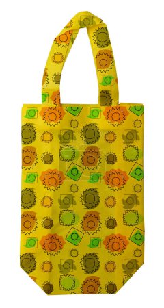 a yellow polypropylene tote bag with floral decoration isolated on a white background. non woven. environmentally friendly bag
