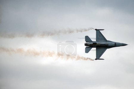 Photo for SLIAC, SLOVAKIA - AUGUST 30: Flight of F-16 Falcon of Royal Netherlands Air Force at SIAF airshow in Sliac, Slovakia on August 30, 2014 - Royalty Free Image