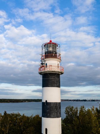 Photo for Lighthouse at the entrance of the harbour - Royalty Free Image