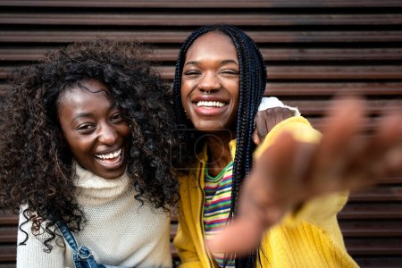 Photo for Stock photo of black young friends smiling and looking at camera - Royalty Free Image
