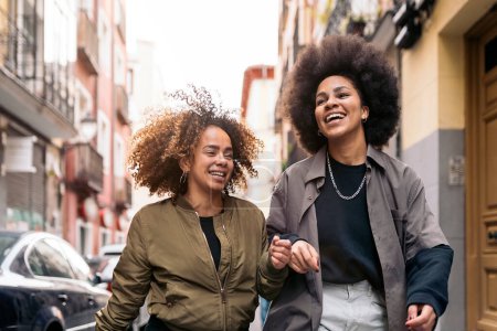 Photo for Stock photo of cool afro girls smiling and having fun in the city. - Royalty Free Image