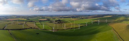 Photo for Windmills in the Cornish countryside cornwall england uk from the air drone aerial - Royalty Free Image