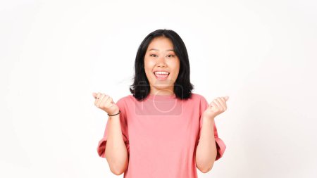 Photo for Young Asian woman in pink t-shirt yes cheerful gesture and smiling to the camera on isolated white background - Royalty Free Image