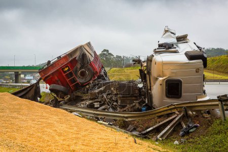 Truck loaded with cereals has an accident on the road.