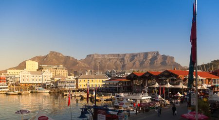 Photo for Cape Town, South Africa. January 1, 2006. View of the Victoria and Alfred Waterfront with Table Mountain in the background on a sunny day. - Royalty Free Image
