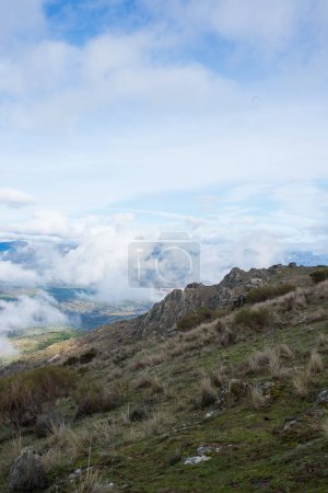 Photo for Beautiful landscape from a hill top.  Low clouds over the valley. Madrid countryside - Royalty Free Image