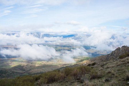 Photo for Beautiful landscape from a hill top.  Low clouds over the valley. Madrid countryside - Royalty Free Image