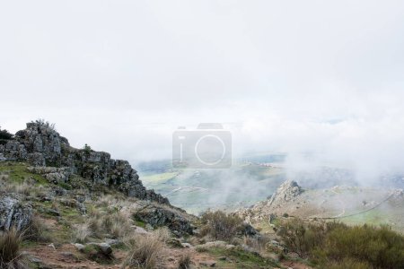 Photo for Landscape seen from a hilltop in a foggy day. Madrid countryside - Royalty Free Image