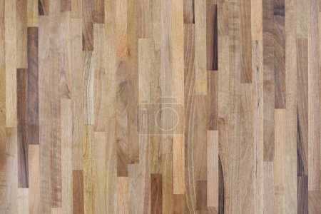 Nahtlose Textur aus braunem Holzboden im Wohnzimmer. Raue Hartholzoberfläche als Hintergrund für Raumgestaltung und Dekoration in Nahaufnahme
