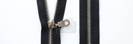 Photo for Top view of open metal zippers for clothing on white background. Zip fastener or zip for sewing and clothes design - Royalty Free Image