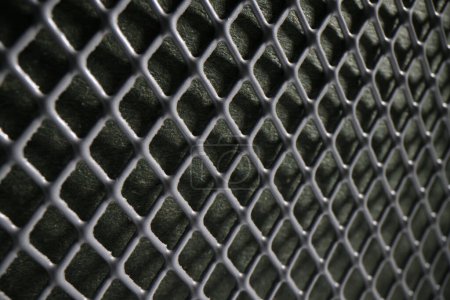 Photo for Durable large metal mesh as abstract industrial background. Dark square metal grid pattern and texture as seamless design element of metal box - Royalty Free Image