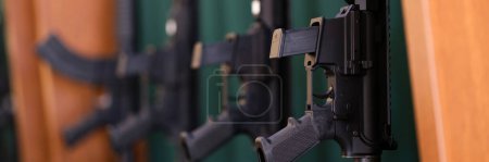 Foto de Close-up of set of rifles and carbines in storage. War, army, police and weapon concept - Imagen libre de derechos