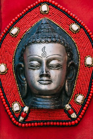 Photo for Mask of the Buddha, Buddha Handicraft kept for sale in the street of Nepal. - Royalty Free Image