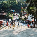 Tourists visitors in Swayambhunath Stupa or The Monkey Temple Premises in Kathmandu Nepal.