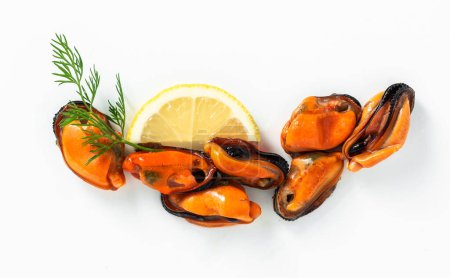 peeled mussels with lemon and dill on a white background