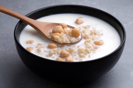 Photo for Cold Yogurt Soup with Chickpeas and Wheat Seeds - Ayran asi Corbasi - Tzatziki - Royalty Free Image