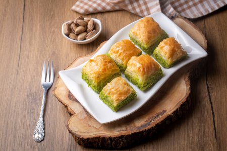 Photo for Traditional delicious Turkish dessert; pistachio baklava (Turkish name; kuru baklava) - Royalty Free Image