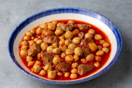 Photo for Traditional delicious Turkish foods; Turkish Food Chickpeas with Meat. Turkish name; Etli nohut - Royalty Free Image