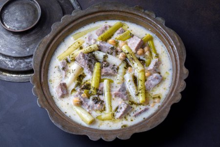 Photo for Siveydiz; (Turkey - Antep Style Local Food) is an Antep dish made with fresh garlic and lamb. Turkish name; Siveydiz - Royalty Free Image