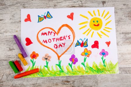 Foto de Children's hand drawn color painting mother's day drawing - Imagen libre de derechos