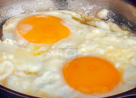 Photo for Fried eggs are delicious, appetizing - Royalty Free Image
